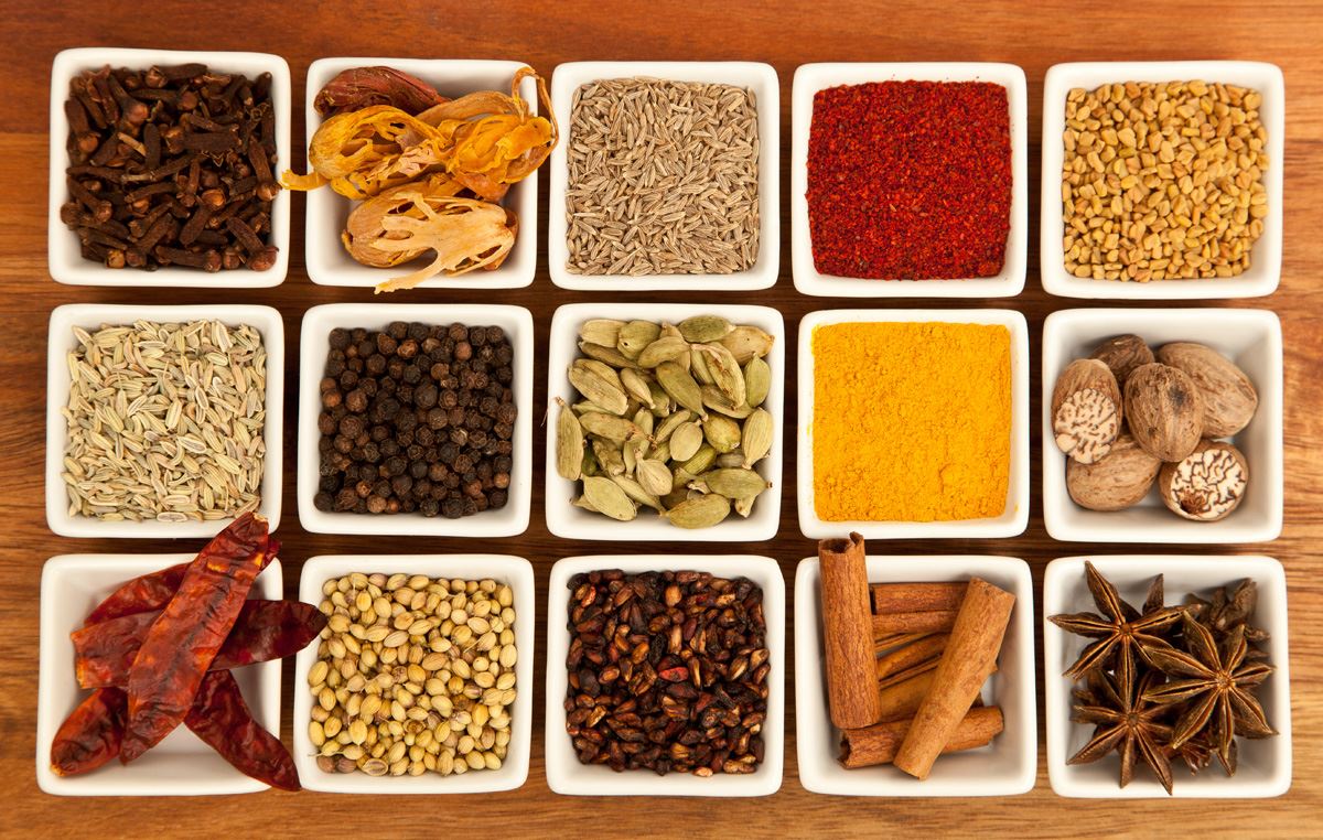 Whole spices in small bowls